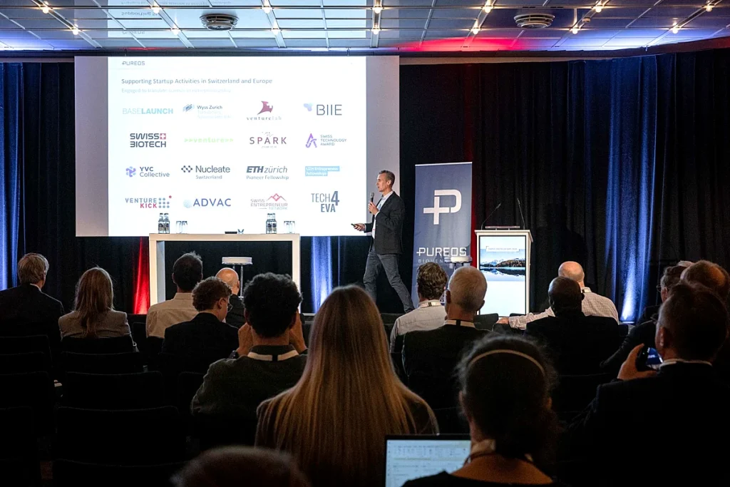 Company presentation in a Swiss Biotech Day session room