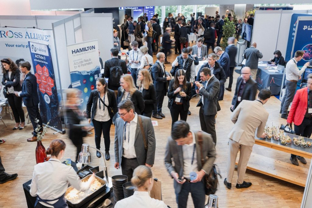 Delegates walking the exhibition floor at the Swiss Biotech Day