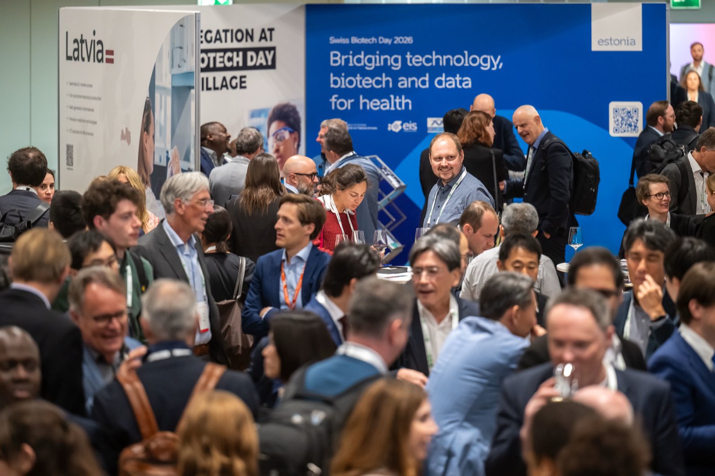 Delegates on the exhibition floor seen from above