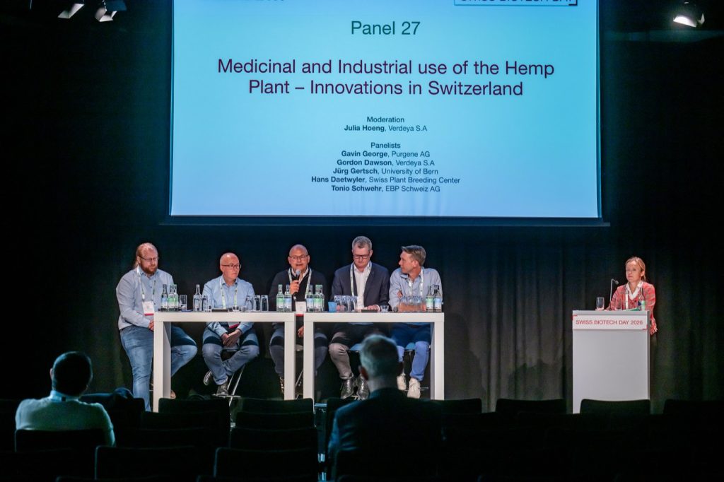 Five panelists on stage at the Swiss Biotech Day 2026