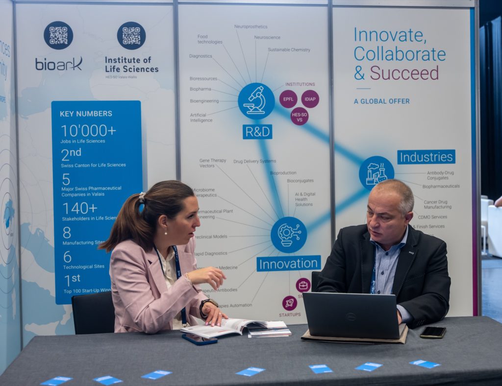 A conversation at the BioArk and HES-SO Valais-Wallis booth of the Valais cluster at the Swiss Biotech Day 2026